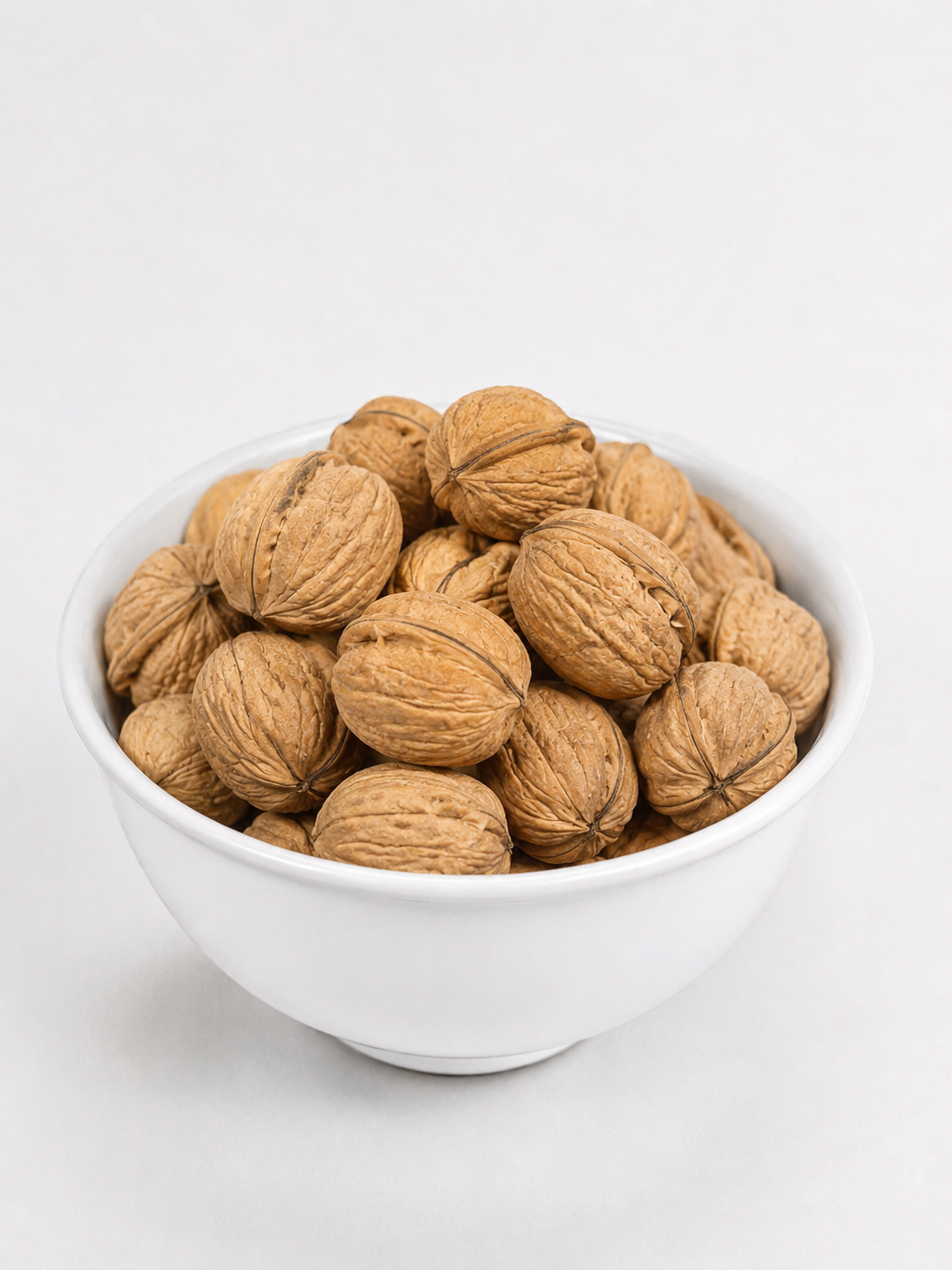 Kesari Ananta Whole Walnuts In-Shell in a bowl